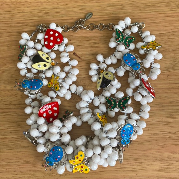 Jewelry - Sassy Jones Love Bug Bib - White